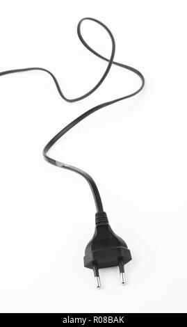 Black electrical plug and electrical cord on white background Stock Photo