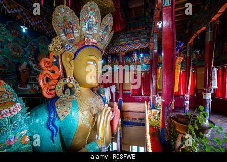 The 15 meters high colorful statue of Maitreya (future Buddha) is one of the main attractions in Thiksey Gompa, one of the most important monasteries  Stock Photo