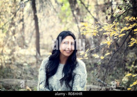 Beautiful Young Hispanic, American Indian, Multi-racial Woman Portrait Outside on a Fall Day Stock Photo