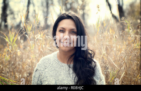 Beautiful Young Hispanic, American Indian, Multi-racial Woman Portrait Outside on a Fall Day Stock Photo