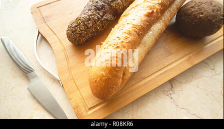 still-life with breads on hardboard Stock Photo