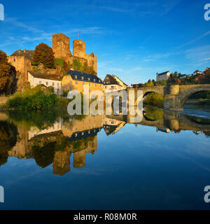 Castle and town Runkel with medieval stone bridge, reflection in the river Lahn, morning light, Runkel, Hesse, Germany Stock Photo