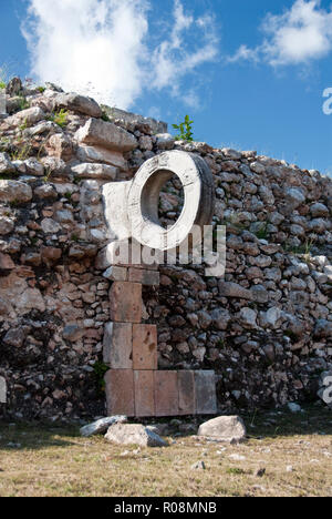 A stone ring at the Great Ball Court used to play a Mesoamerican ballgame, at the Uxmal archaeological site, Yucatan, Mexico. Stock Photo