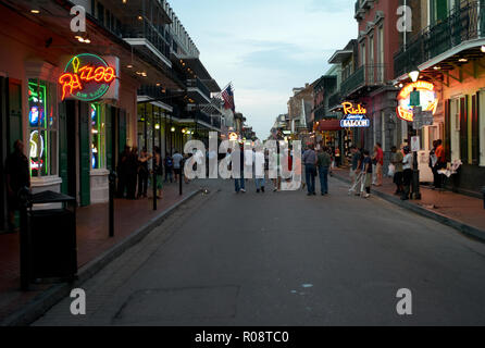 NEW ORLEANS, USA - JULY 17, 2009: World famous Bourbon Street in the French Quarter of New Orleans, Louisiana in the evening with artificial lighting. Stock Photo