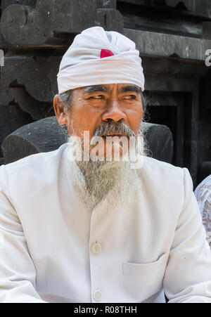 Portrait of an indonesian man in traditional clothing on Bali island Stock Photo
