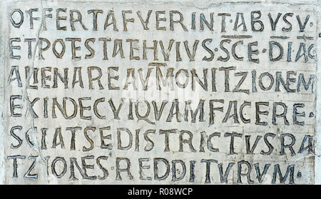 Latin inscription on ancient wall of Church of Santa Maria in Cosmedin in Rome, Italy Stock Photo