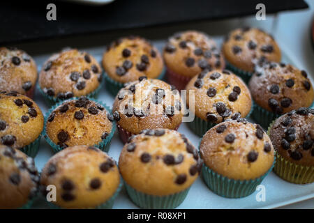 Details of chocolate chips muffins on a plate Stock Photo