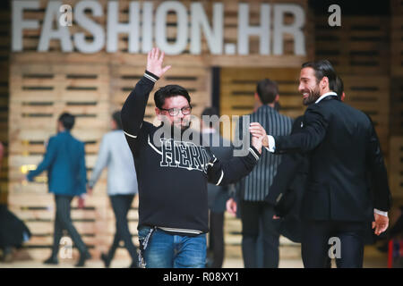 ZAGREB, CROATIA - OCTOBER 27, 2018 : Fashion designer Ivica Klaric on catwalk with models wearing clothes for autumn-winter, designed by IK Studio on  Stock Photo