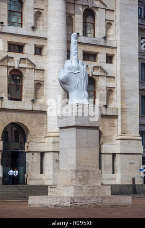 Milan, Italy - 14.08.2018: Middle finger sculpture at Piazza Affari, symbol of freedom. Stock Photo