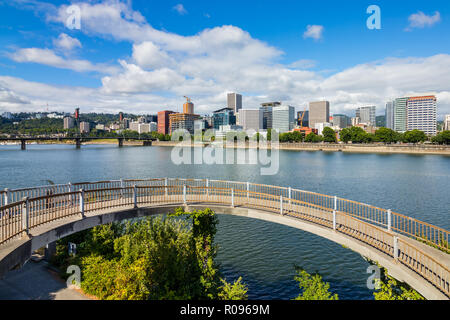 Skyscrapers in downtown Portland Oregon next to a Willamette River Stock Photo
