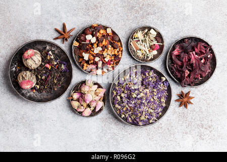 Various dry tea. Black, green and red tea. Top view Stock Photo