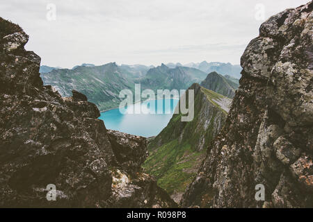 Mountains over fjord landscape in Norway aerial view Travel vacations scenic Senja islands Stock Photo