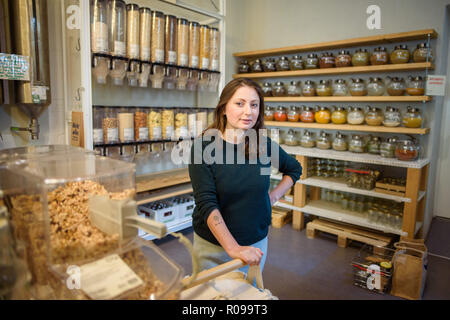 Berlin, Germany. 02nd Nov, 2018. Milena Glimbovski, founder and managing director of the store 'Original Unverpackt', is standing in front of a shelf in her shop in the district Kreuzberg shortly after opening the store. For her commitment to the environment, she was named Berlin entrepreneur of the year. Their store, opened four years ago, sells food without repackaging for a more sustainable shopping experience. Credit: Gregor Fischer/dpa/Alamy Live News Stock Photo