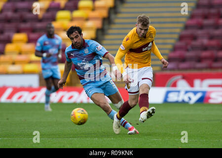 Fir Park, Motherwell, UK. 3rd Nov, 2018. Ladbrokes Premiership football, Motherwell versus Dundee; Chris Cadden of Motherwell and Sofien Moussa of Dundee Credit: Action Plus Sports/Alamy Live News Stock Photo