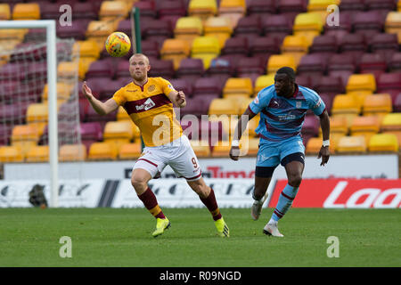 Fir Park, Motherwell, UK. 3rd Nov, 2018. Ladbrokes Premiership football, Motherwell versus Dundee; Curtis Main of Motherwell and Genserix Kusunga of Dundee Credit: Action Plus Sports/Alamy Live News Stock Photo