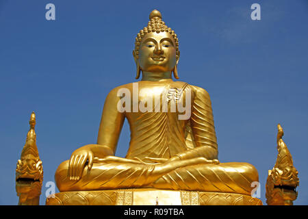 Golden Buddha statue next to Big Buddha on Phuket, Thailand