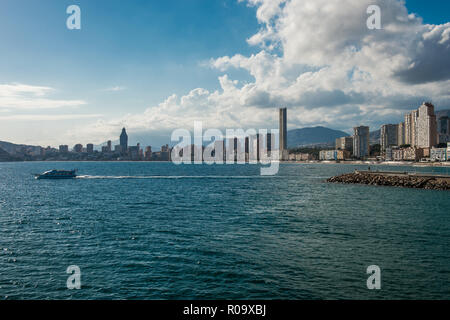 Panoramic view of Benidorm, in Spain.Benidorm Alicante playa de Poniente beach sunset in Spain.Skyscrapers near the beach in Benidorm, Spain.Skyline o Stock Photo