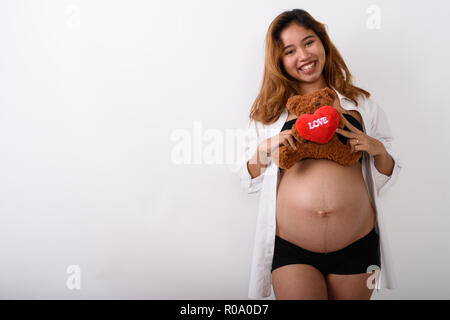 Portrait of beautiful young pregnant Asian woman Stock Photo