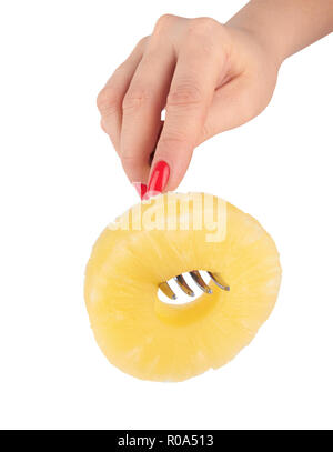 slice of pineapple on a fork isolated on white background Stock Photo