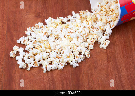 popcorn is filled on a wooden background Stock Photo
