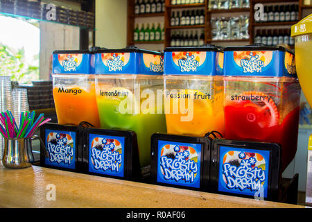 3 May 2018 A row of colourful slush puppy ice makers in a small shop at the Sea of Galilee in Israel. These treats bring welcome refreshment on a hot  Stock Photo