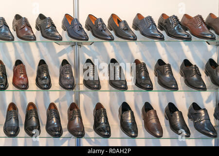 https://l450v.alamy.com/450v/r0ah2p/mens-leather-shoes-on-the-shelf-in-the-store-racks-in-the-store-of-clothes-and-accessories-shelves-with-stylish-mens-shoes-many-classic-shoes-and-r0ah2p.jpg