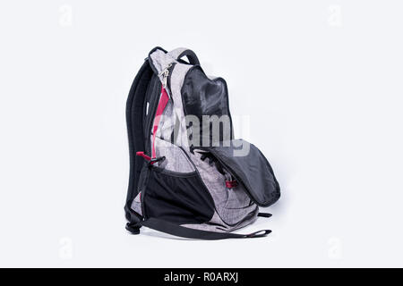 Empty gray backpack isolated on white background. Stock Photo