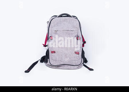 Empty gray backpack isolated on white background. Stock Photo