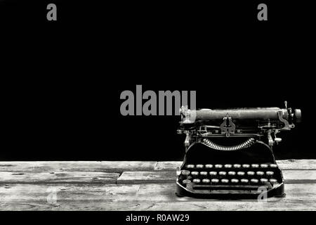 Antique portable typewritter made in 1917 with room for your type in black and white. Stock Photo