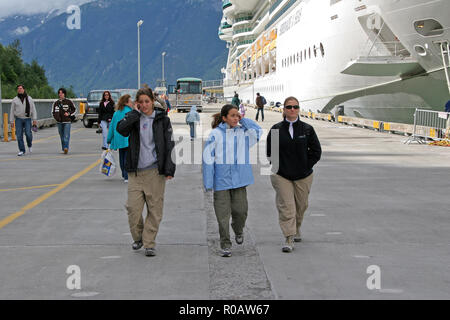 Skagway, Alaska - 08/02/2006: Cruise passengers on dock during a stop while on an Inside Passage cruise.