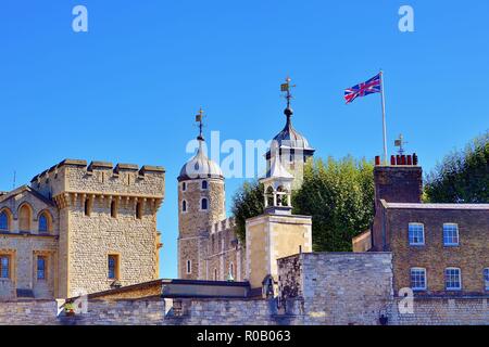 London, England, United Kingdom. White Tower within the Inner Ward of the Tower of London partially obscured by outer region structures. Stock Photo