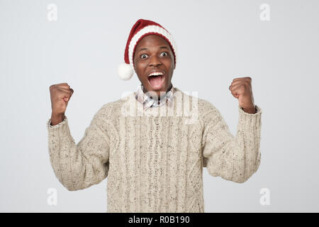 Handsome christmas man is posing in studio Stock Photo
