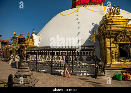Visitors turning the prayer wheels at Swayambunath Stupa (Monkey Temple ...