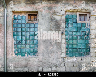 Very old Soviet style glass brick windows in industrial zone Stock Photo