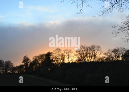 A day with dramatic clouds and wintry showers, February 2018, in Kent, UK, at One Tree Hill on the North Downs' Greensand Ridge, near Sevenoaks Stock Photo