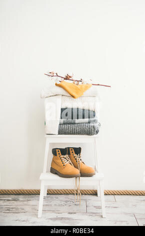 Warm clothing, blankets, boots and cap for cold weather Stock Photo