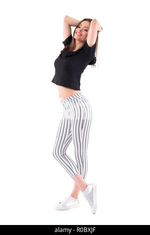 Brunette Woman in White Top and Vinyl Leggings Stock Photo - Image of  creative, fashion: 159691550