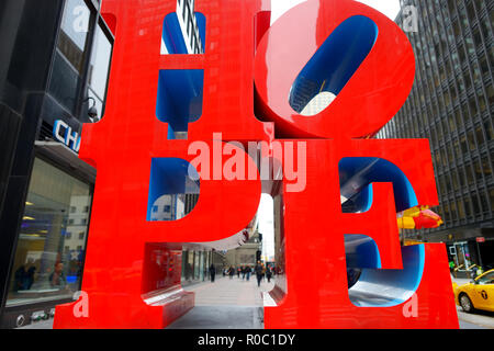 NEW YORK - MARCH 20, 2015: The famous Hope Sculpture at the intersection of the 7th avenue and 53th street, New York City, USA. Stock Photo