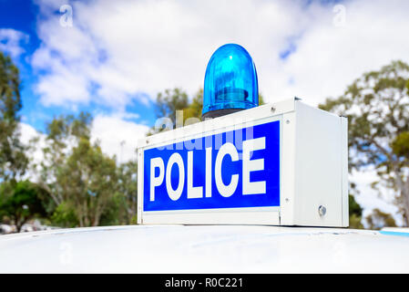 Vintage police blue emergency light installed on car roof Stock Photo
