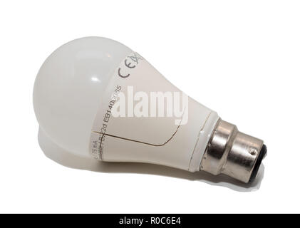LED light bulb with crack in housing, isolated on a white background. Stock Photo