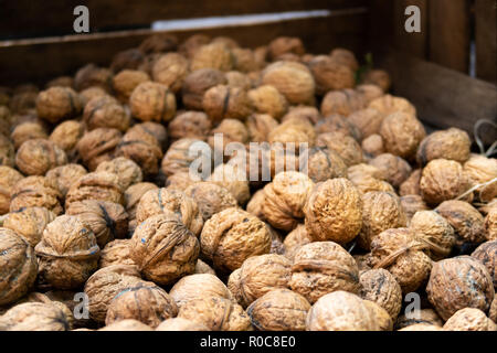 Basket of Walnuts on display in London's Borough Market Stock Photo