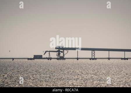 Canada Salt Company pier and conveyor system for loading salt on ships on the island of Old Harry in the Magdalen Islands, Quebec, Canada. Stock Photo