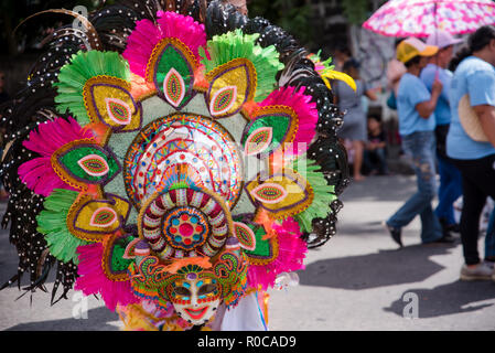 Parade of colorful smiling mask at 2018 Masskara Festival, Bacolod City, Philippines. Stock Photo