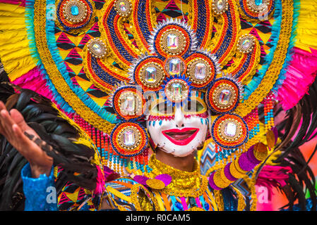 Parade of colorful smiling mask at 2018 Masskara Festival, Bacolod City, Philippines. Stock Photo