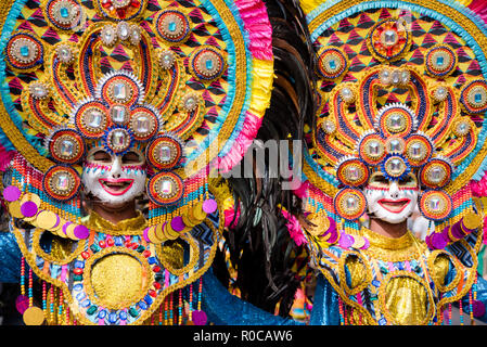 Parade of colorful smiling mask at 2018 Masskara Festival, Bacolod City, Philippines. Stock Photo