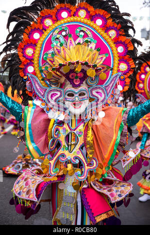 Parade of colorful smiling mask at 2018 Masskara Festival, Bacolod City, Philippines. Stock Photo