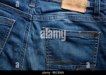 Back of an indigo color blue jean and its pocket. Close up. Stock Photo