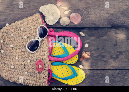 Beach accessories on wooden board. Vintage style Stock Photo