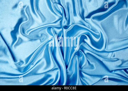 Blue luxury satin fabric texture for background Stock Photo