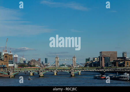The Tower of London and Southwark Bridge in London on a sunny day Stock Photo